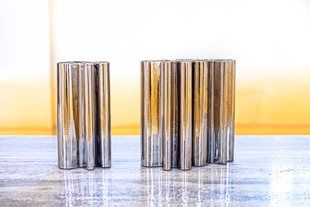 stylish material lamps on the table in the interiorの写真素材