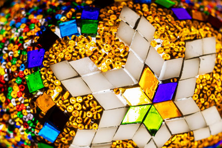 stained glass lamp on a dark background with a geometric pattern