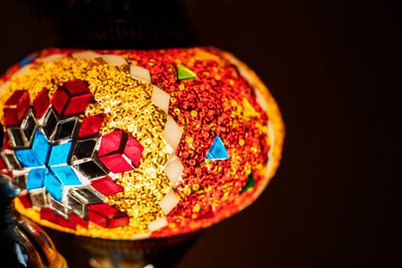 stained glass lamp on a dark background with a geometric pattern