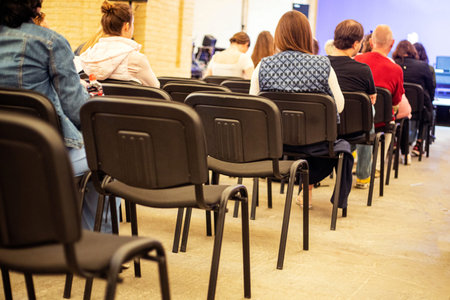 several generations at a public lecture, conference, speech