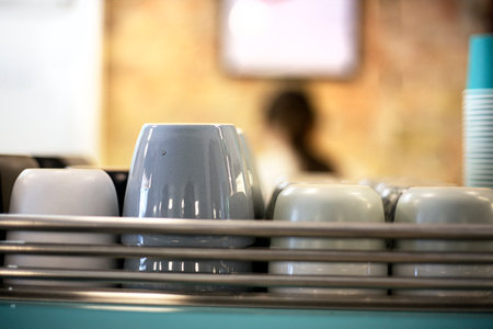 stylish ceramic cups in a cafe for coffee and teaの写真素材