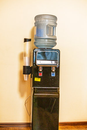 bottle of purified drinking water with hot and warm regulation in the officeの写真素材