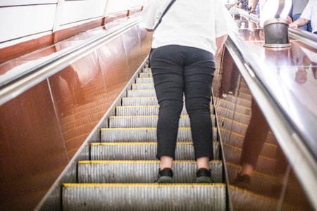 go up and down the escalator from the underground metro