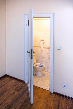 toilet room with light on, modern interiorの写真素材