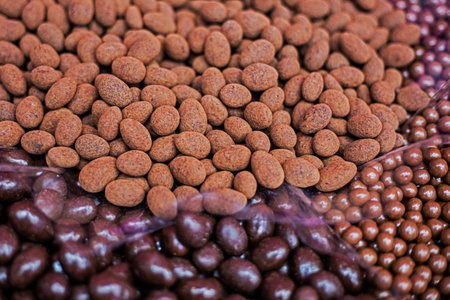 chocolate various nuts in chocolate glaze and in chocolate crumbs