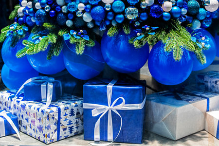 stylish decorative Christmas decorations and gifts in blue shades. Preparation for Christmas and New Yearの写真素材