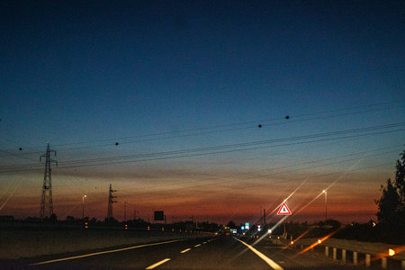 highway before dawn. night road trip by car. Driver safety
