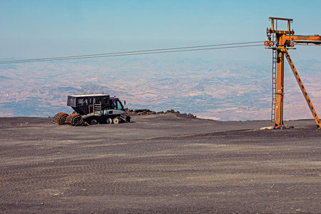 snow removal machine ratrak on the mountainside with a beautiful view. Opening of the season Sicilyの写真素材