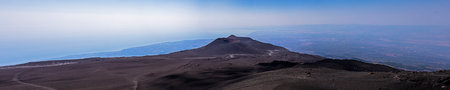 Panaramic view of the crater on Mount Etna and Sicily during the day. Traveling in Sicilyの写真素材