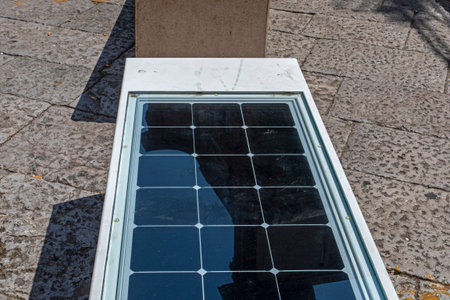 Solar panels on benches in the city. Traveling through Sicily and Italy