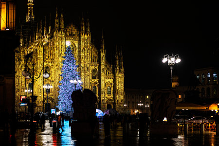 Milan Cathedral at night in the rain with a Christmas holidayの写真素材