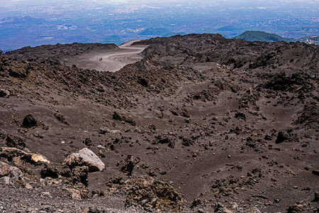 Beautiful scenery of Sicily and a road with the active volcano Etna during the day. Traveling in Italyの写真素材