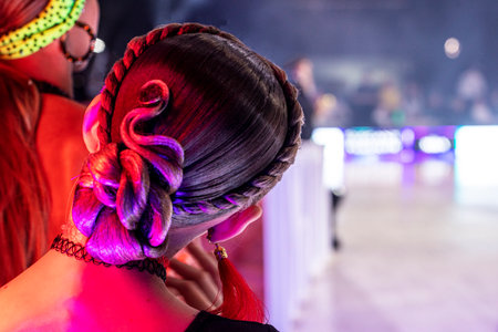 beautiful curled and slicked-back hairstyle for a young dancer.の写真素材