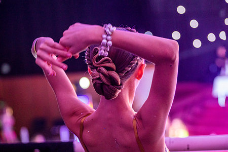 young dancer dancing on the dance floor in a Latin American programの写真素材