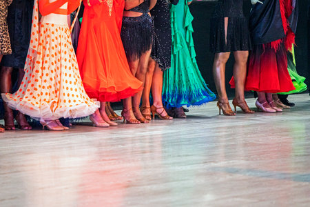 Dancers in bright dresses before the dance competition.の写真素材