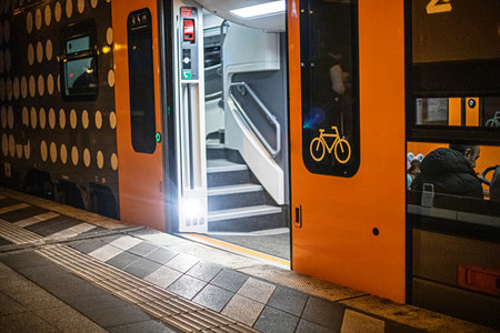 Open automatic doors on a modern train in Europe. Traveling around Europe.の写真素材