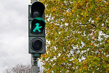 iconic green man at a traffic light in Berlin, a "No Passing" sign for pedestrians.の写真素材