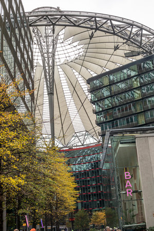 modern high-rise building against a gloomy sky.の写真素材