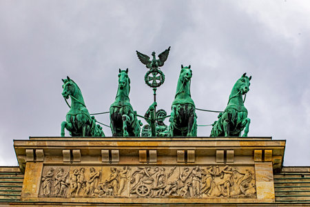 Quadriga at the Brandenburg Gate on a cloudy day. Traveling in Europeの写真素材