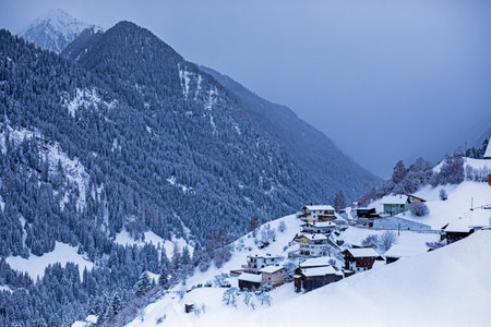 Snow-covered Alps at an Austrian mountain resort in the evening