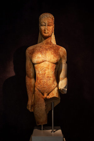 Marble statue of Kouros on a dark backgroundの写真素材