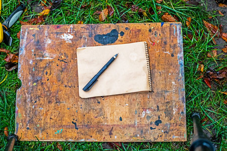 Pen on a craft notebook outside
