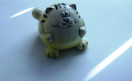 porcelain saltcellar in the form of a catの写真素材