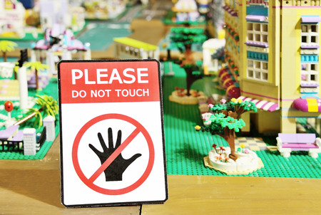 please do not  touch sign front of the toy modelの写真素材