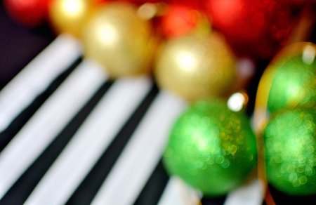 solf and blured focus christmas ball on black tableclothの写真素材