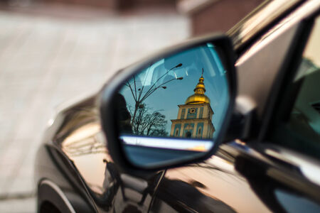 Reflection of the Orthodox Church in the car mirror.の写真素材