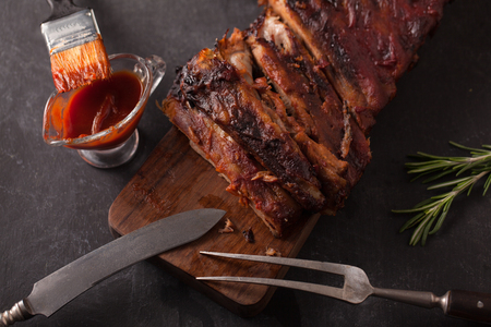 Delicious barbecued ribs seasoned with a spicy basting sauceの写真素材