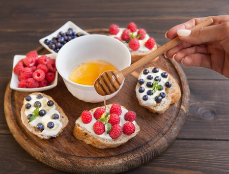 Sandwich with berries. Healthy breakfastの写真素材