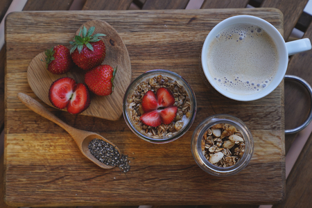 chia seeds pudding on wooden background wiyh coffee. breakfast setの写真素材