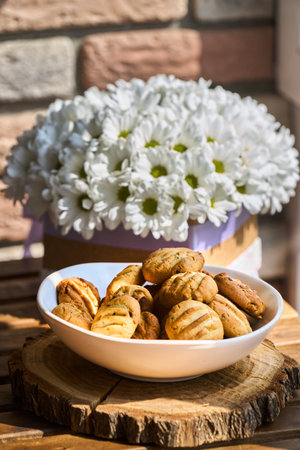 Homemade cookies with nuts, wood background, selective focus
