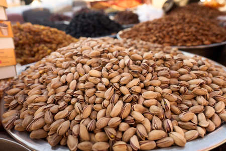 Salted and roasted pistachio for sale on a market in Antalya, Turkeyの写真素材
