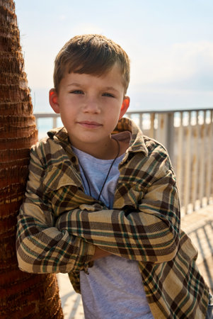 Portrait of a sad boy on a sunny dayの写真素材