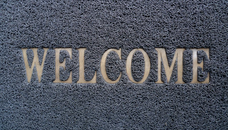 Old welcome doormat の写真素材