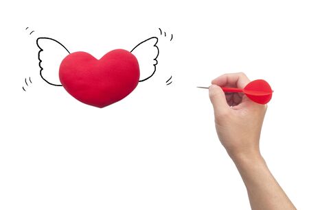 Dart Hitting heart, Isolated On White Backgroundの写真素材