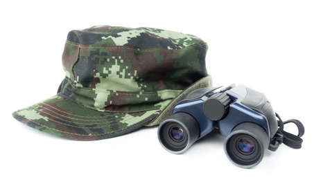 Khaki cap with binoculars on white background の写真素材