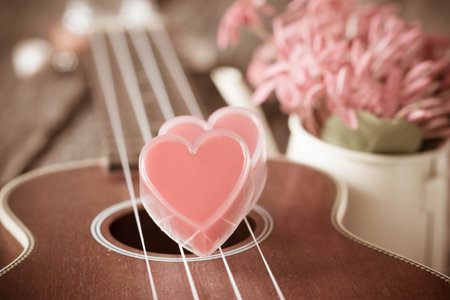 Valentines Day background with hearts and guitar.