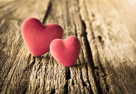Red heart on old wood,Valentines background.の写真素材