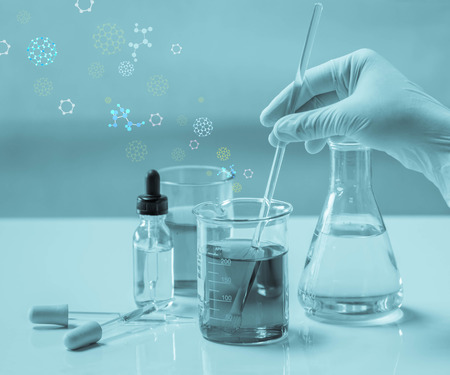 Scientist hand holding a Test tubes,Laboratory research.の写真素材