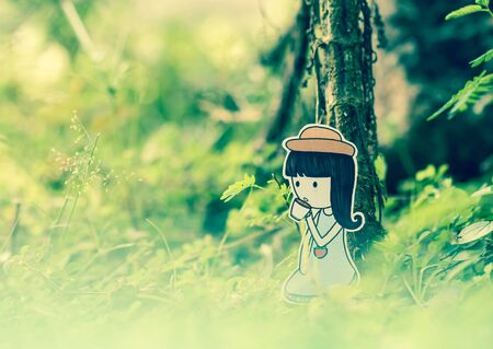 Young woman drinking hot coffee in the nature.の写真素材