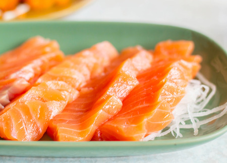 salmon sashimi set on dish.の写真素材