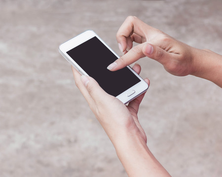 Woman Using a Smart Phoneの写真素材