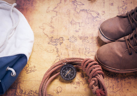 compass on vintage map with accessory to the Adventure.の写真素材