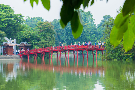 Hanoi, Vietnam - August 2016. Hanoi Red Bridge.The wooden red-painted bridge over the Hoan Kiem Lake connects the shore and the Jade Island on which Ngoc Son Temple stands. Hanoi on August 12, 2016のeditorial素材