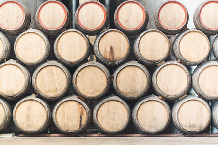 Wine barrels stacked in the wine cellar, Thailand.の写真素材