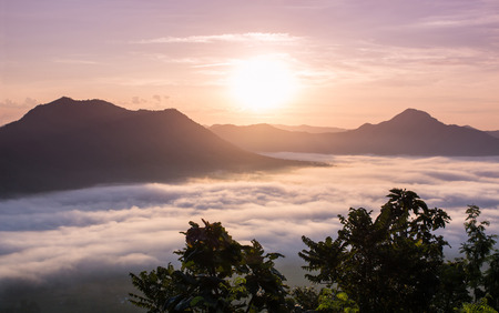 Landscape with fog on the mountains.with sunrise.の写真素材