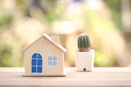 Wooden home model on table.の写真素材